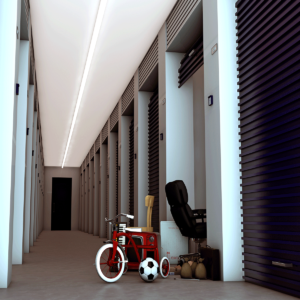 indoor view of climate control storage hallway, with children's bicycle, soccer ball, and other items not fully inside the unit yet