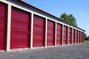 an array of storage units with red doors