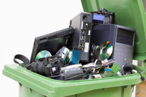 Electronics in a plastic bin ready to be put into climate control storage. 