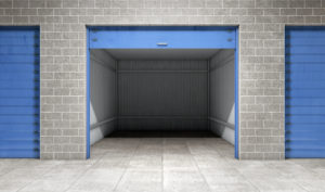 empty storage unit with a blue door